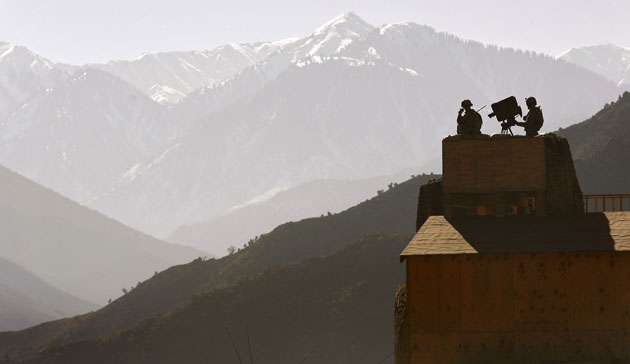 Gallery 24 hours in pictures: U.S. Army soldiers keep watch from lookout tower near Pakistan border