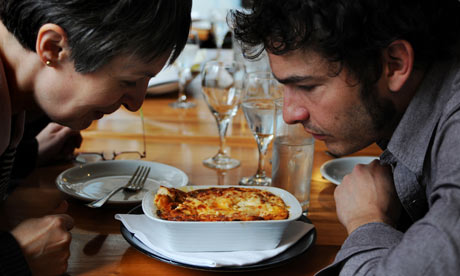 Sybil Kapoor and Giles Coren inspecting a moussaka cooked by Aldo Zilli and 