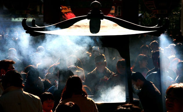 Gallery 24 hours in pictures: Worshippers at the Asakusa Sensoji temple 