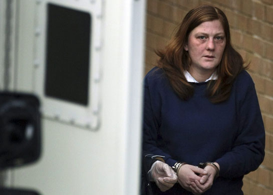Gallery Shannon Matthews case: A handcuffed Karen Matthews, the mother of Shannon Matthews 