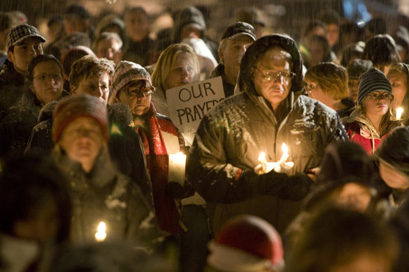 Gallery 30 December 2008: Sparwood, Canada: People gather at a candle light vigil