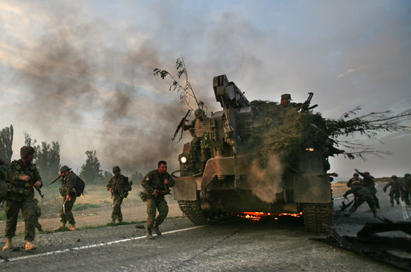 Gallery Tisdall year: Gori, Georgia: Soldiers escape their burning armoured vehicle