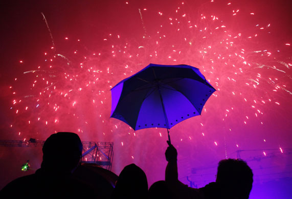 Gallery New Year: Manila, Philippines: Spectators watch a fireworks display