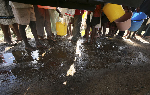 Gallery Zimbabwe cholera: People collect clean water from a UNICEF truck in Harare