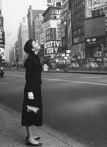 Gallery 1951 Audrey Hepburn looks up at billboards in middle of Times 