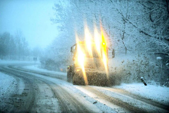Gallery December snow: A snow plow clears snow from a road in County Durham