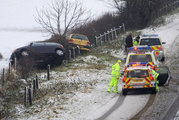 Gallery December snow: Two cars in a ditch at the side of the A64 road near York