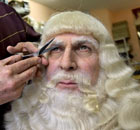 Saint Nicholas has his eyebrows trimmed