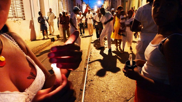 Gallery 24 hours in pictures: Cubans Celebrate Anniversary Of Catholic Saint And Santeria God