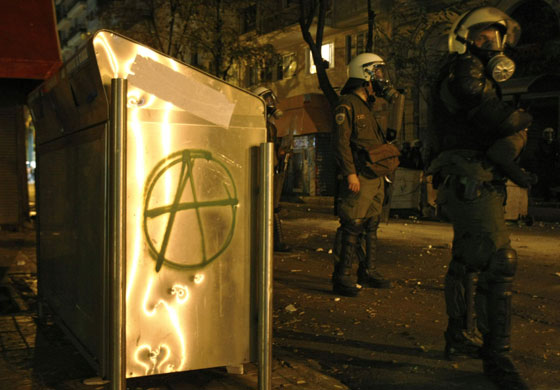 Gallery Riots in Athens: Policemen take up positions during riots in Athens