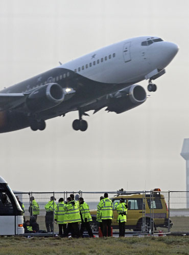 Gallery Stansted protest: A plane takes off at Stansted after protests