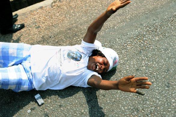 Gallery December 9 2008: Accra, Ghana: A female supporter of the National Democratic Congress