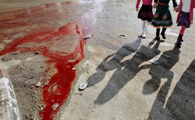 Gallery December 9 2008: A Palestinian family during the holiday of Eid al-Adha