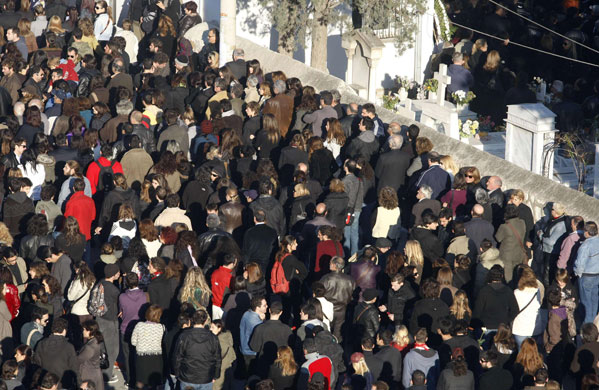 Gallery Funeral in Athens: Mourners wait outside the church to pay at the funeral of Grigoropoulos 