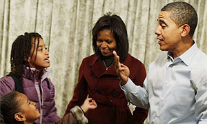 President-elect Barack Obama and his wife Michelle Obama get their daughters ready for their first day of school