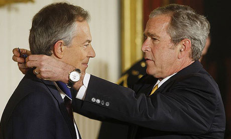 George Bush presents Tony Blair with a presidential medal of freedom