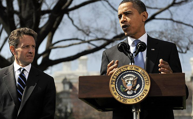 Barack Obama stands with treasury secretary Timothy Geithner 