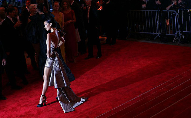 Victoria Beckham struts her stuff on the red carpet at the Metropolitan Museum of Art's costume institute gala 