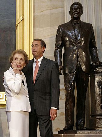  Former first lady Nancy Reagan wipes a tear as she stands with House Minority Leader John Boehner (R-OH) in front of the newly-unveiled statue of her late husband, former U.S. President Ronald Reagan, during a ceremony in the Capitol Rotunda on Capitol Hill in Washington June 3, 2009