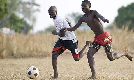 The Katine Actors football team in training at the Katine primary school field