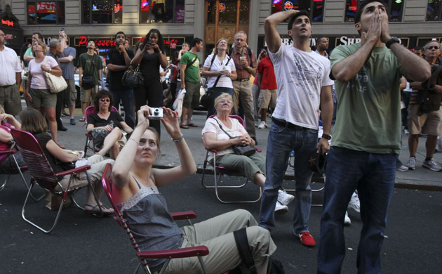 A crowd at Times Square in New York reacts to the news that Michael Jackson has died