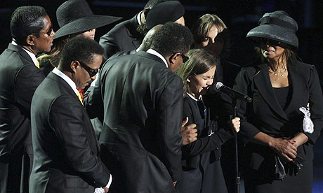 Paris Jackson, Michael Jackson's daughter, cries during her father's memorial service.