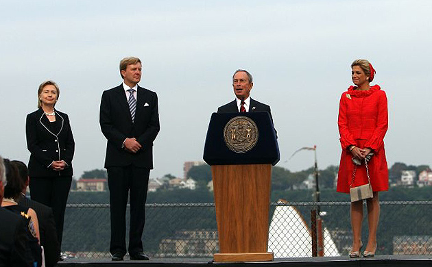 Michael, New York's mayor, speaks while Hillary Clinton, Prince Willem-Alexander and  Princess Maxima look on during a ceremony celebrating the 600th anniversary of Henry Hudson trip up the Hudson River