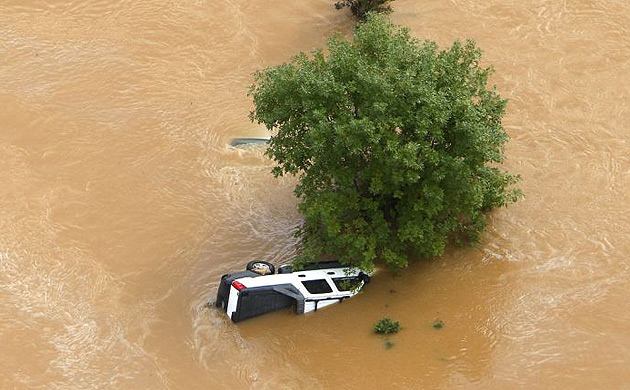 A truck is submerged in flood waters in Mableton, Georgia. Days of downpours and thunderstorms saturated the ground of states in the south-east just months after an epic two-year drought in the region ended after winter rains