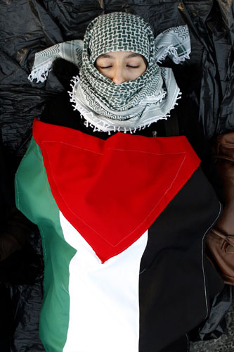 Gallery Gaza protests: A pro-Palestinian demonstrator in Paris