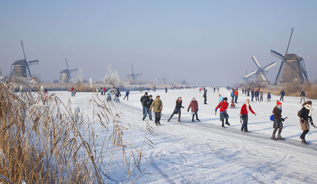 Gallery Eyewitness: Skaters at the Unesco World Heritage site in Kinderdijk