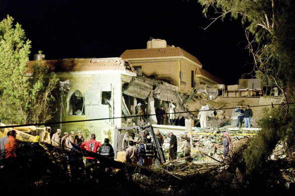 Gallery 12 January 2009: Ahmadi, Kuwait: Authorities search a damaged Islamic Shiite prayer hall