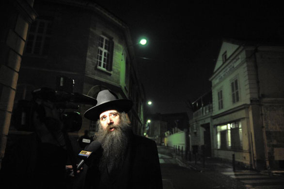 Gallery 12 January 2009: Saint-Denis rabbi Belinow Mendel next to his synagogue