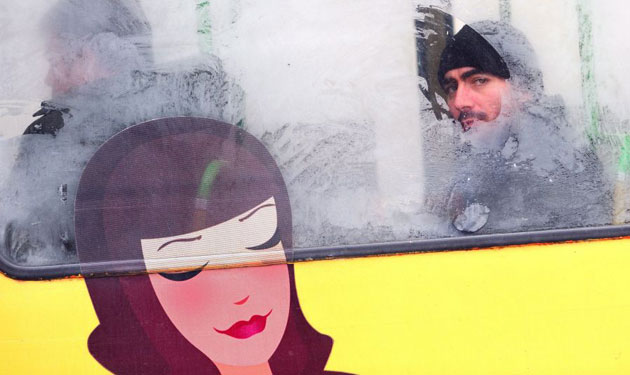 Gallery 12 January 2009: Sofia, Bulgaria: A man looks out of the window of a tram