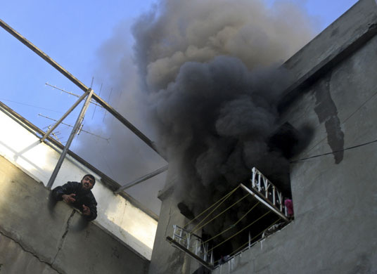 Gallery gaza: Burning Building in Gaza