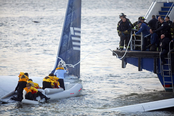 Gallery Hudson river plane crash: Passengers are rescued from a US Airways plane