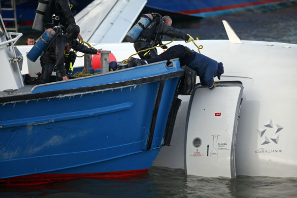 Gallery Hudson river plane crash: Emergency personnel search for more passengers on the US Airways plane