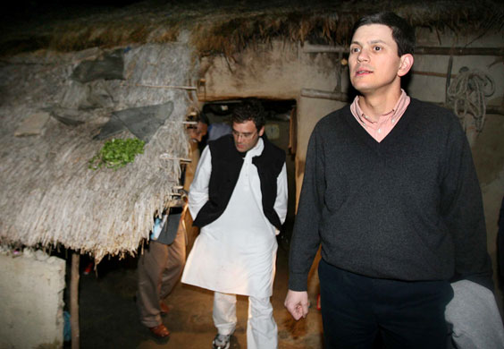 Gallery Miliband in India: David Miliband exits a hut in India