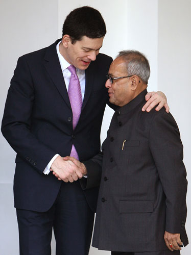 Gallery Miliband in India: David Miliband talks with India's FM Mukherjee in India