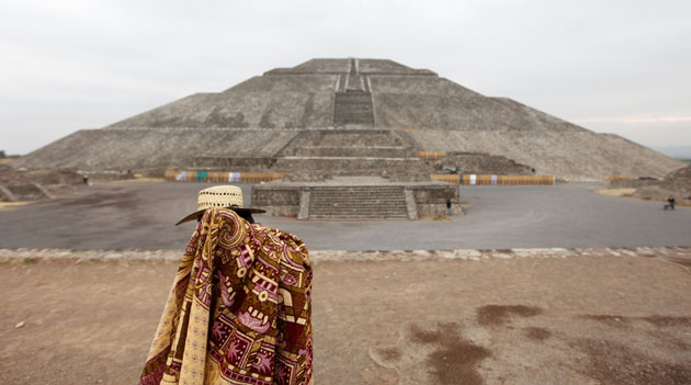Gallery 24 hours in pictures: A vendor sells blankets in front of the Pyramid of the Sun