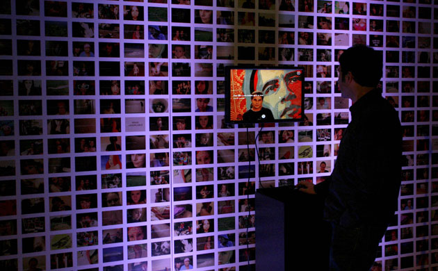 Gallery 24 hours in pictures: Artist Sep Kamvar looks at an image of President-elect Barack Obama