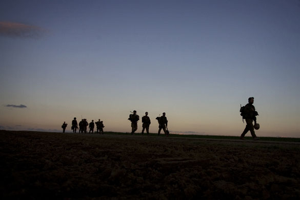 Gallery Withdrawal from Gaza: Israeli soldiers walk in formation as they leave the Gaza strip