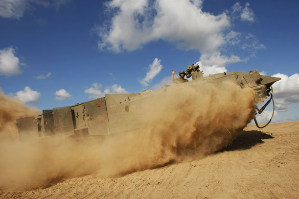 Gallery Withdrawal from Gaza: An Israeli soldier, atop of an armored vehicle, returns to Israel