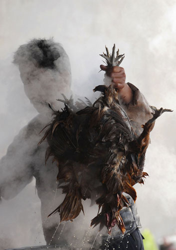 Gallery 24 hours in pictures: chickenseller in China