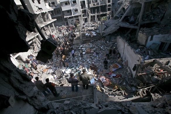 Gallery Gaza then and now: Al Sheikh Redwan area, Gaza City: Palestinians inspect the rubble 