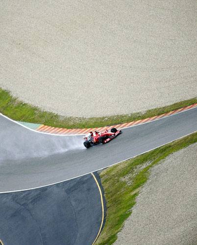 Gallery 20 January 2009: Finnish driver Kimi Raikkonen steers the Ferrari F60 Formula One 2009 car