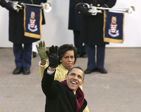Gallery Obama's inaugural parade : Barack and Michelle Obama walk down Pennsylvania Avenue in Washington