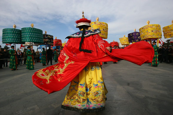 Gallery 21 January 2009: Beijing, China: A performer rehearses his steps during a ceremony