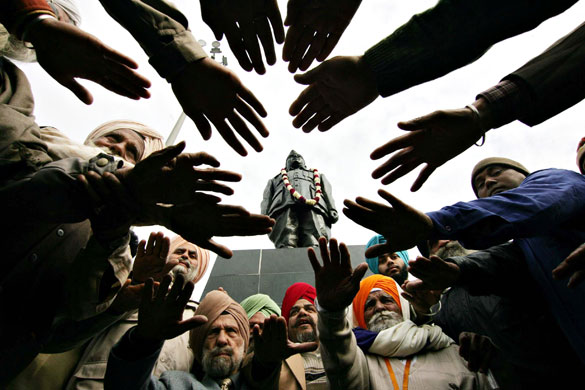 Gallery 23 January 2009: Members of the Azad Hind Fauj Association take an oath against terrorism