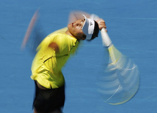 Gallery Australian open : Spain's Garrigues serves to   Navarro   Australian Open 