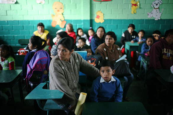 Gallery 27 January 2009: Guatemala: Mothers accompany their children during the first day of classes